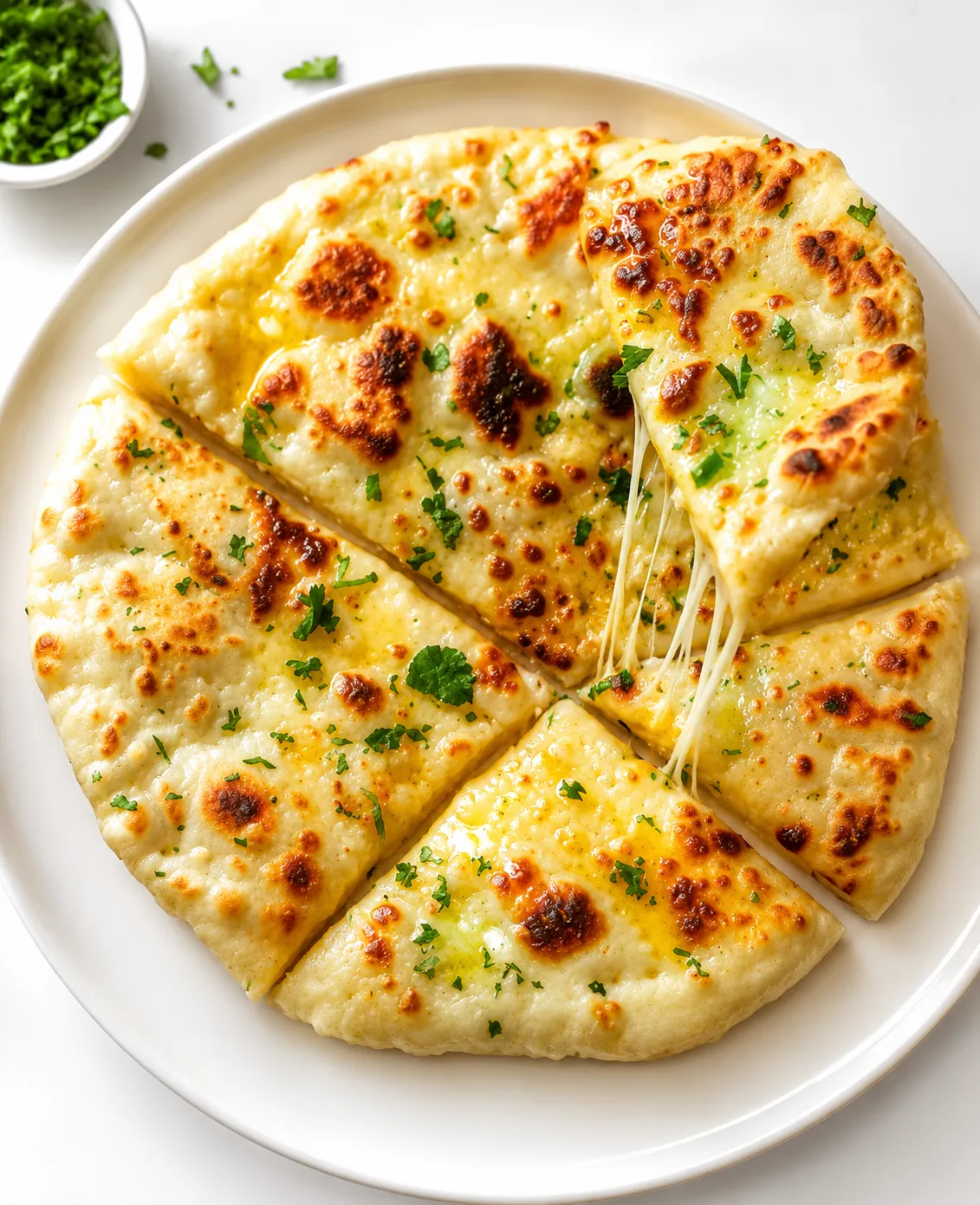 Cheesy Garlic Naan at Craving Curries - Fresh tandoor naan in Charleswood Winnipeg